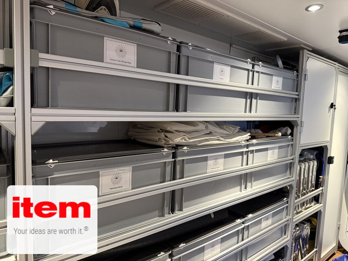Bespoke item24 storage shelving with labelled bins on board