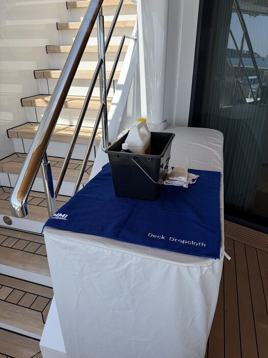 MMI Deck Dropcloth folded and stowed in a labelled bin