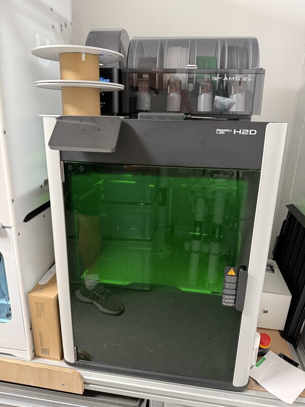 Bambu Lab H2D 3D printer with laser engraver installed on board